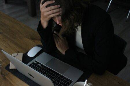 woman stressed at desk