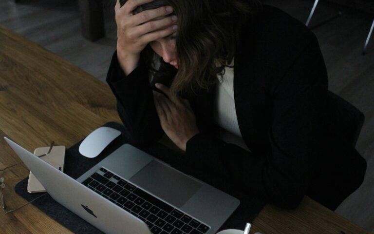 woman stressed at desk